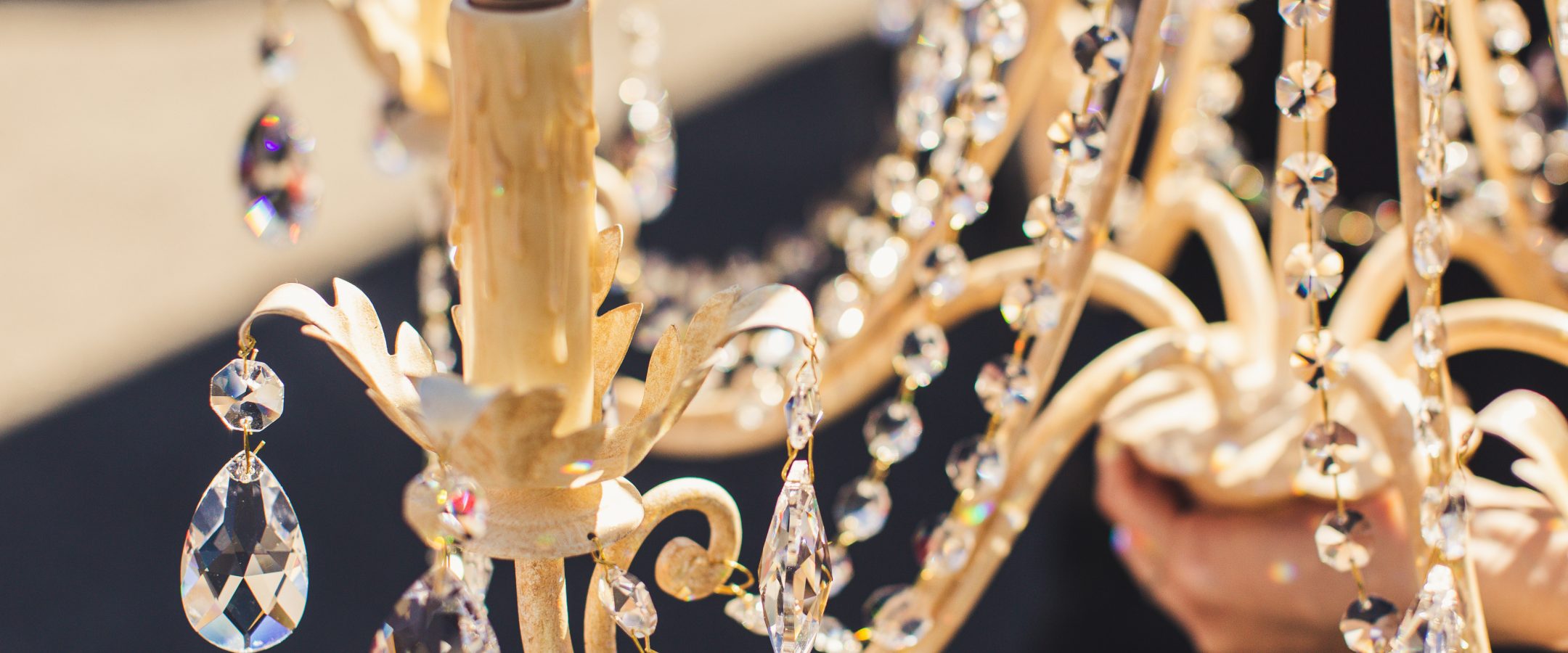 A close-up image of a crystal chandelier.