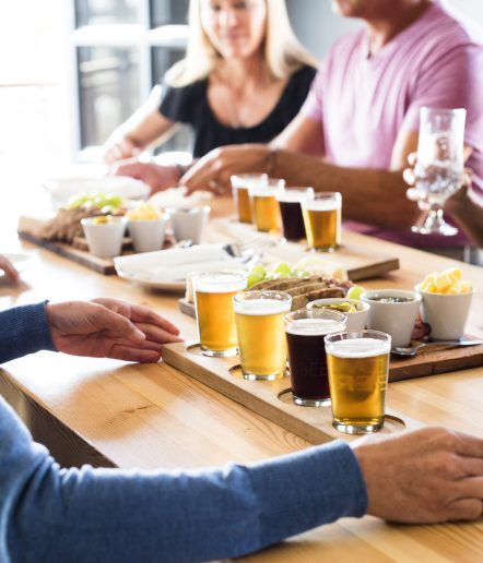 two tasting trays of different beer